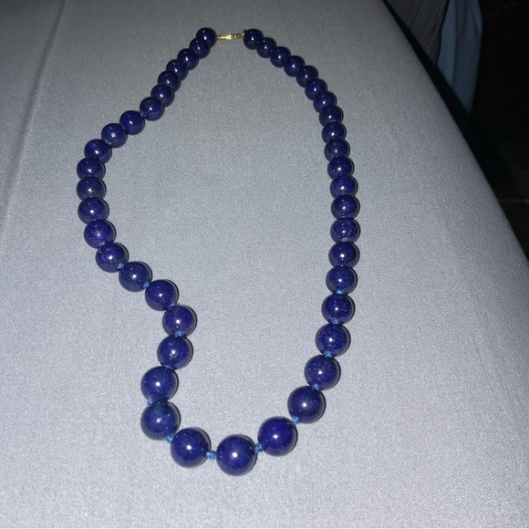 BLUE LAPIS NECKLACE an 14K yellow gold clasp.18 inches.